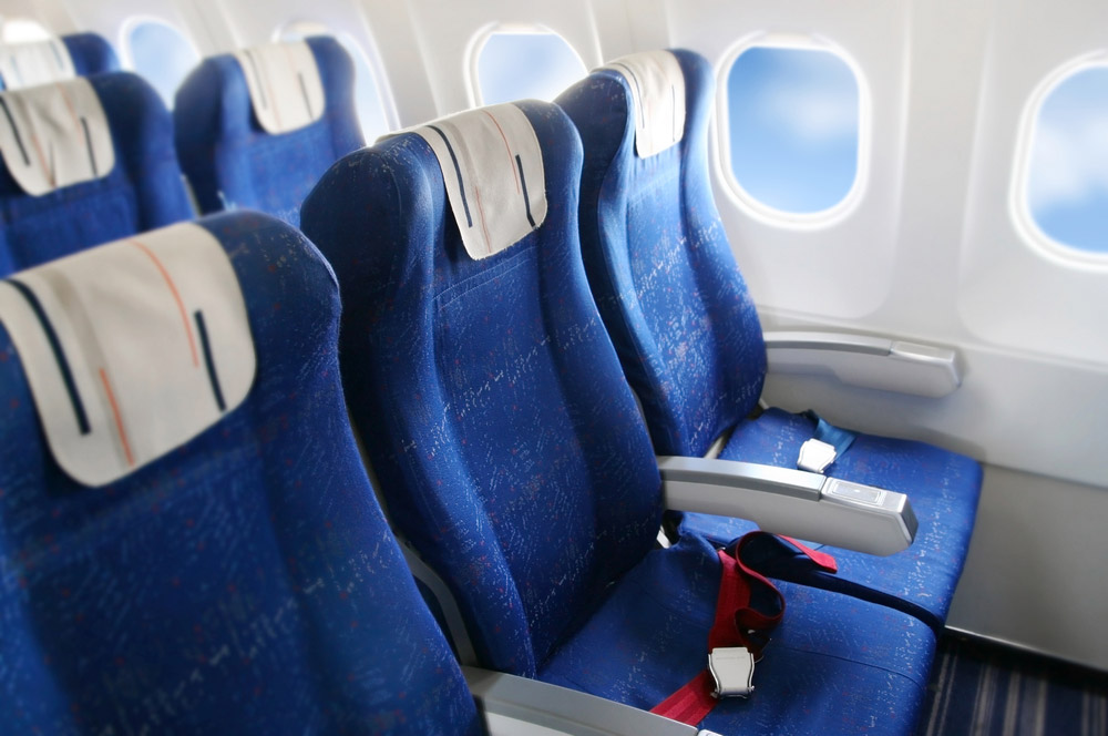 Erweiterte Beinfreiheit in der Premium Economy. Quelle: Shutterstock.com